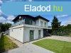 Eladó családi ház Budapest, XXII. kerület, 	ÚJ, MODERN CSALÁ