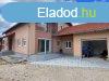 Kny - 2 lakrszes csaldi hz zlethelyisggel elad