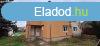Kaposvron egy fldszinti szigetelt tglalaks elad.