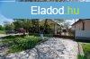 Elad csaldi hz Komdi kzpont