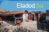 Elad csaldi hz Komdi kzpont